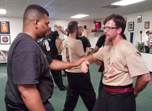 Tai Chi Students practicing Push Hands